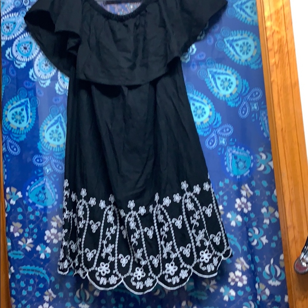 Black dress with white stitching